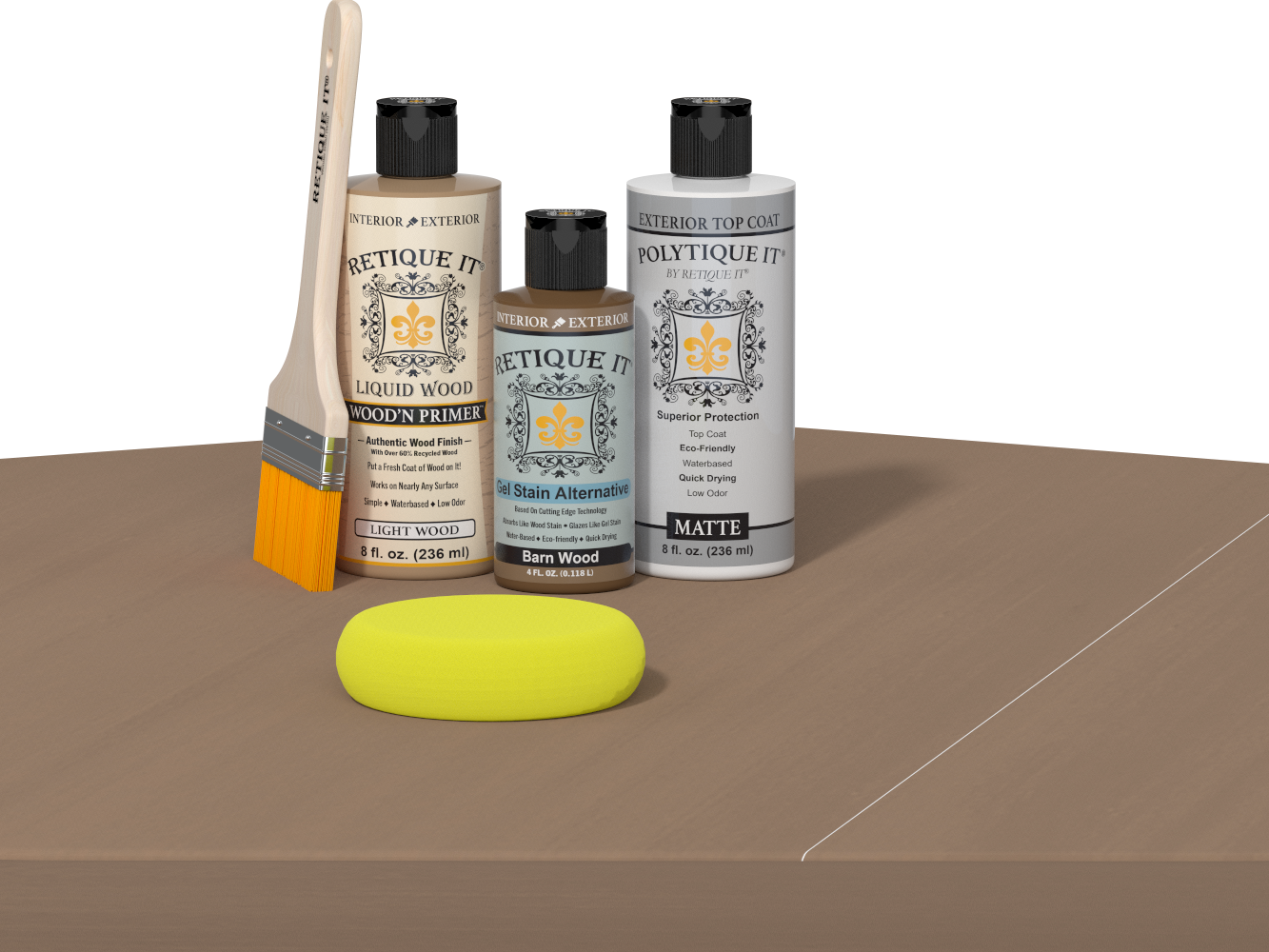 Retique It Barn Wood Kit with Light Wood Wood'n Primer, Barn Wood Gel Stain Alternative, Matte Polytique It topcoat, paintbrush, and yellow sponge on a tabletop.