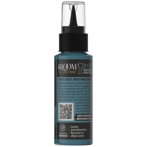 Back of DecoArt Bloom Texture Paint bottle in Patina Teal showing product details and label text