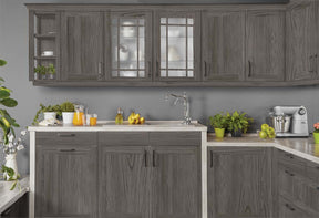 Retique It Wood'n Finish Kit in Harbor Gray for kitchen cabinets, showing a grained wood surface and finishing tools.