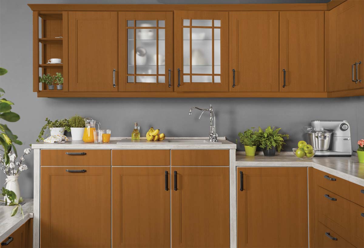 Retique It Multi-purpose Smooth Finish Kit in cedar for wood and furniture renovation, shown on kitchen cabinets.