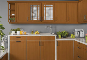 Retique It Multi-purpose Smooth Finish Kit in cedar for wood and furniture renovation, shown on kitchen cabinets.