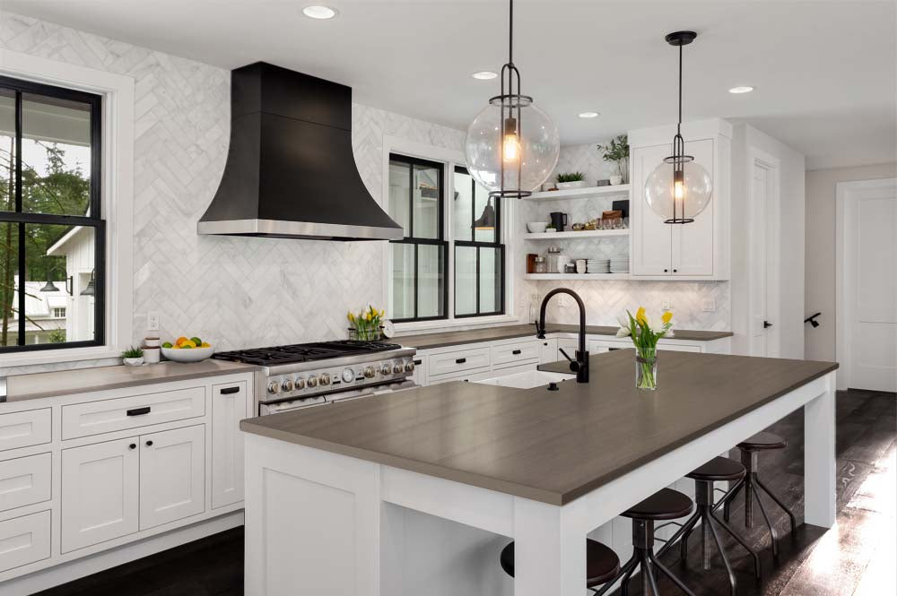 Retique It Multi-purpose Smooth Finish Kit in Harbor Gray for wood and exterior surfaces, shown on a kitchen countertop.