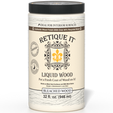 Liquid Wood bleach interior paint by Retique It® in a 32oz container, showing the lightened, bleached wood finish on a sample surface.