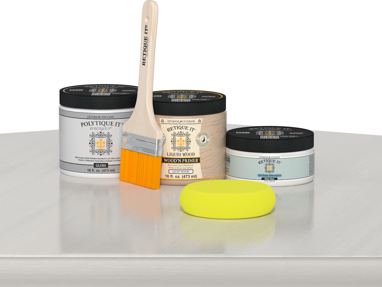 Retique It® White Wash Multipurpose Kit contents with Liquid Wood primer, White Wash gel stain alternative, PolyTique It® gloss exterior top coat, paintbrush, and yellow sponge displayed on a white wood surface.