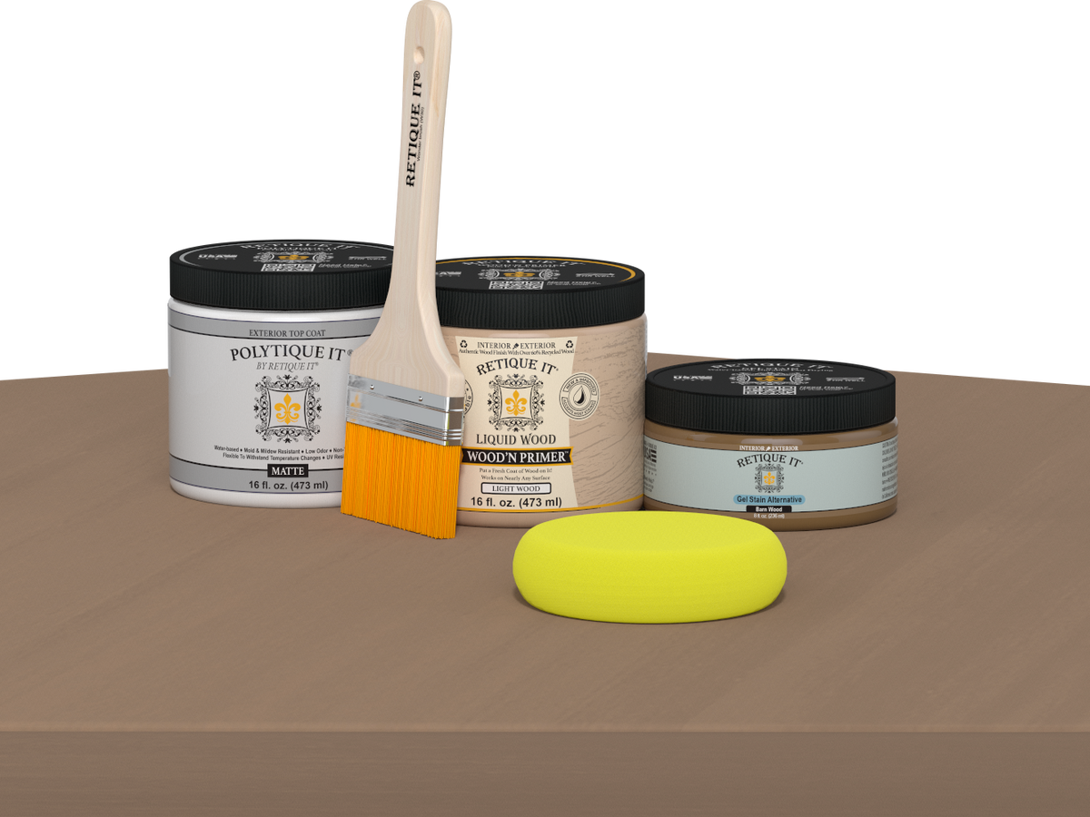 Retique It® Barn Wood Multipurpose Kit contents with Light Wood Liquid Wood primer, Barn Wood gel stain alternative, PolyTique It® matte exterior top coat, paintbrush, and yellow sponge displayed on a wood surface.