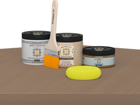 Retique It® Barn Wood Multipurpose Kit contents with Light Wood Liquid Wood primer, Barn Wood gel stain alternative, PolyTique It® matte exterior top coat, paintbrush, and yellow sponge displayed on a wood surface.