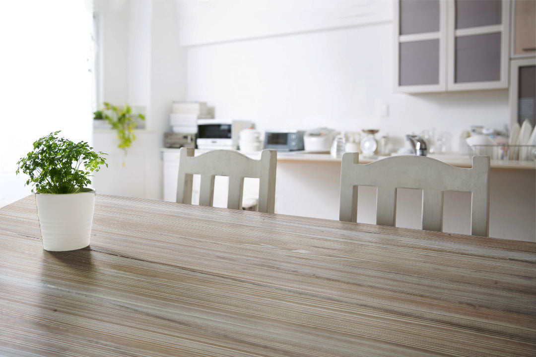 Raw wood tabletop with a natural, grained finish from Retique It® Bleached Wood Wood'n Finish Kit, showing a smooth, light-colored surface.
