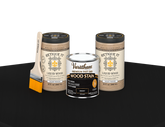 64 oz Retique It Liquid Wood kit with Varathane Ebony stain and a paintbrush on a matching finished tabletop.