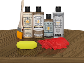 Retique It Wood'n Finish Kit for Barn Wood exterior topcoat, showing a kit with wood finish products on a table.