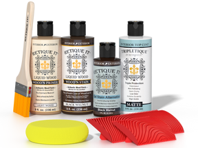 Retique It® Black Walnut Wood'n Kit with Matte TripleTique® includes a brush, Light Wood primer, Black Walnut stain, Black Walnut Gel Stain Alternative, Matte TripleTique® top coat, a yellow sponge, and a red graining tool.