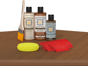 Retique It Cedar wood stain kit for fireplace mantels, featuring wood finish application on a table surface.