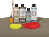 Retique It® Wood'n Finish Kit with driftwood interior top coat, showing a wood table surface with a natural driftwood finish.