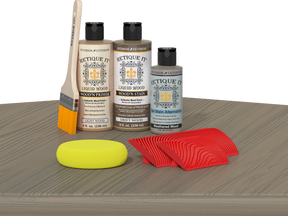 Retique It® Wood'n Finish Kit in Drift Wood, a multi-purpose kit with wood finishing supplies on a table.