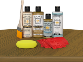 Retique It® Old Oak Wood'n Kit with Light Wood primer, Old Oak stain, Old Oak gel stain alternative, Gloss Tripletique® Top Coat, brush, red graining tool, and yellow sponge.