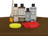 Retique ItÂ® Wood'n Finish Kit in Dark Pecan, exterior top coat, displayed on table with wood sample for multi-purpose wood finishing.