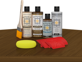 Retique ItÂ® Wood'n Finish Kit in Dark Pecan with exterior top coat, displayed on a table for multi-purpose wood finishing.