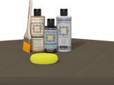 Retique It refinishing kit with Light Wood primer, Black Walnut gel stain alternative, matte Polytique It topcoat, a brush and yellow sponge.