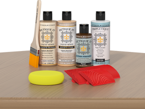 Retique It® Wood'n Finish Kit in Pickled Oak for interior top coat, shown on a wooden table with application tools.