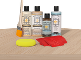 Retique It® Wood'n Finish Kit in White Oak for interior top coat application, shown on a wooden table surface.