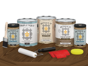 Retique It® Wood'n Finish Kit in Modern Walnut, satin topcoat, showing four large wood finish bottles on a table.