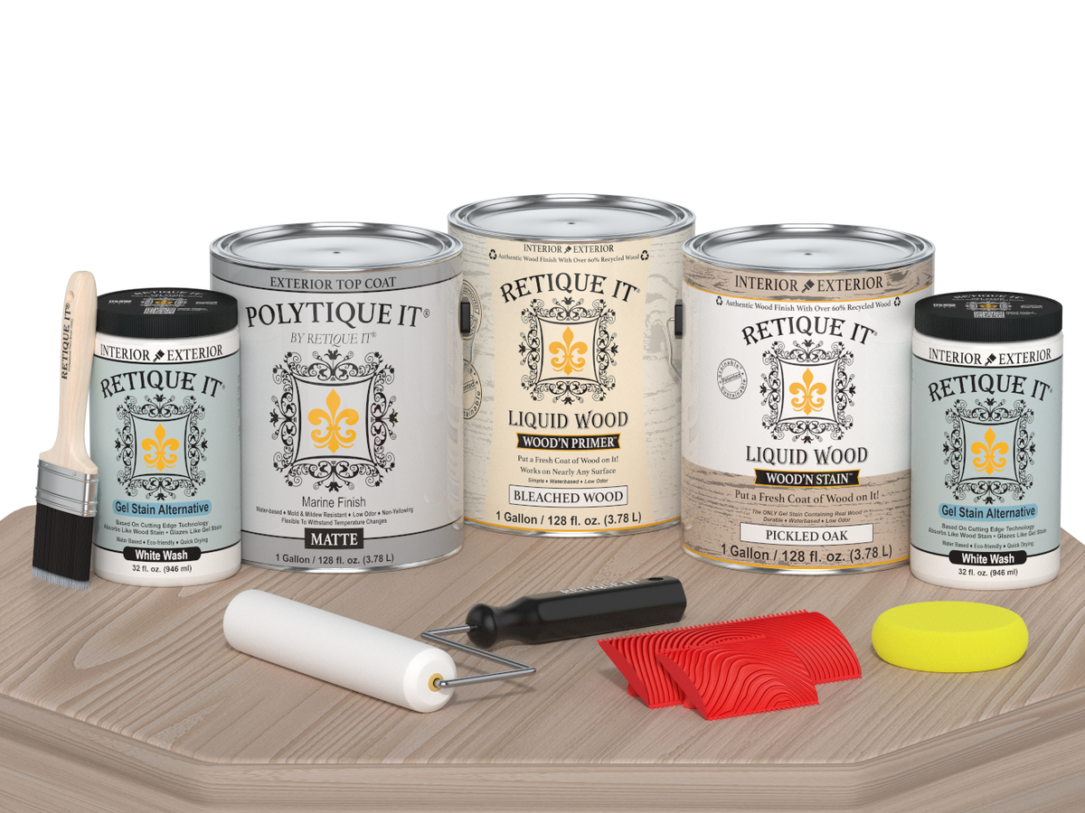 Sun-bleached Retique It Wood'n Finish Kit with four large exterior top coat containers on a table, matte finish for wood projects.