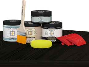 Retique It® countertop kit for kitchen island in classic black with wood stain finish, displayed on a kitchen table.