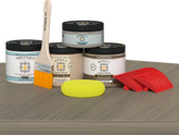 Retique It Wood'n Finish Kit in Drift Wood stain, double size, displayed on a table showing the stain application and wood finish.