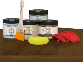 Retique It® Wood'n Finish Kit in Dark Pecan stain, double size, with wood stain bottles and application tools on a table.