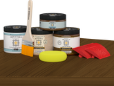Retique It® Wood'n Finish Kit Double Size in Dark Pecan stain, showing the stain applicator and sample wood surface.