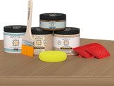 Retique It® Pickled Oak countertop kit for kitchen island with stain finish, displayed on a modern kitchen table.
