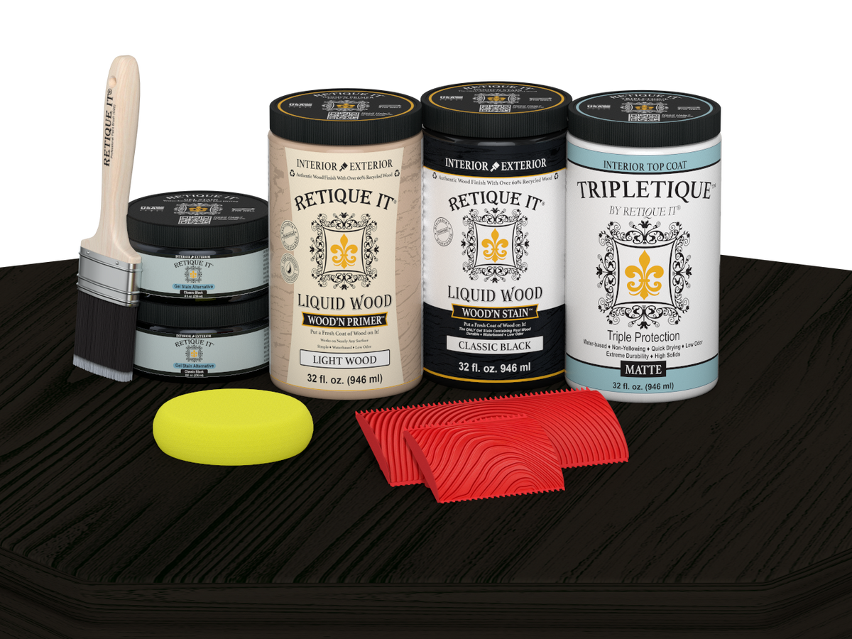 Retique It Wood'n Finish Kit with four large black stain bottles and matte finish on a table surface.
