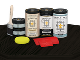 Retique It Wood'n Finish Kit with four large black stain bottles and matte finish on a table surface.