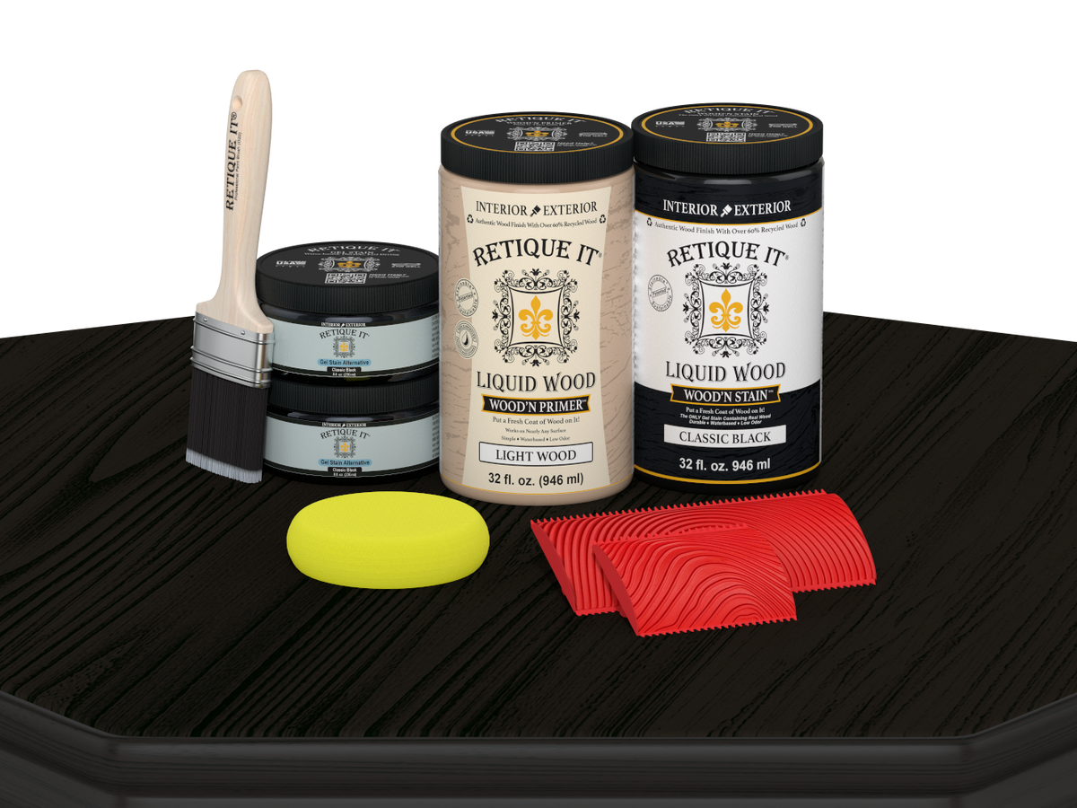 Retique It Wood'n Cabinet Kit in classic black with 12 grained door stains, displayed on a table for cabinet renovation.