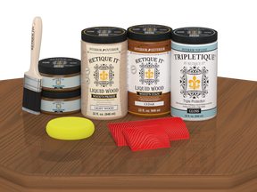 Retique It® Wood'n Finish Kit in cedar for tabletops, containing four large stain bottles with a glossy finish.