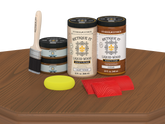 Retique It Wood'n Finish Front Door Kit for double cedar doors, including stain and finishing supplies, displayed on a table.