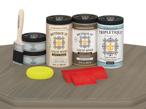 Retique It Wood'n Finish Kit in Drift Wood with four large stains, featuring matte finish on a tabletop surface.