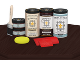 Retique It Red Mahogany countertop stain kit for full kitchen, matte finish on a wooden surface.