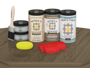 Retique It® Wood'n Cabinet Kit with 12 weathered wood grain stain doors, glossy finish, displayed on a table.