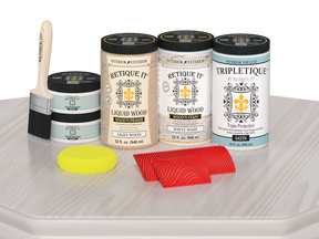 Retique It® Wood'n Finish Kit with four large white wash stain bottles for tabletops, satin finish on wood surface.