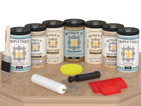 White oak Wood'n Cabinet Kit with gloss stain, featuring 24 grained cabinet doors by Retique It® on a table.