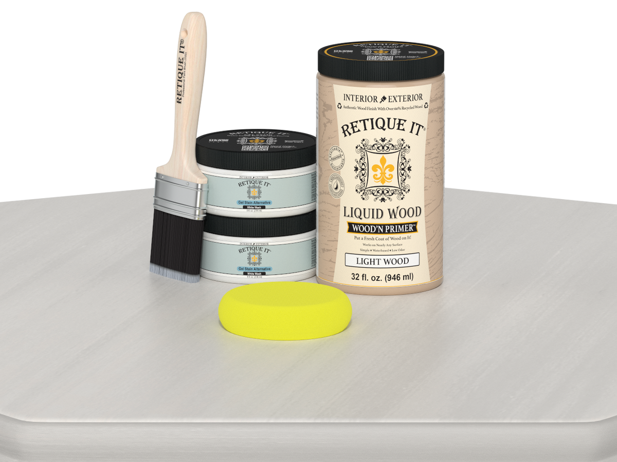 Retique It® Wood'n Cabinet Kit with 12 smooth, white wash stained cabinet doors arranged on a table.