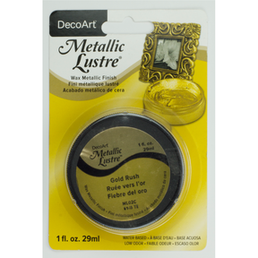 DecoArt Metallic Lustre Champagne Ice in 1 oz bottle, shiny metallic finish on smooth surface, ideal for craft and art projects.