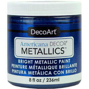 DecoArt Americana Decor Metallics pearl paint in an 8 oz bottle, showcasing its shiny, metallic finish and label on the container.