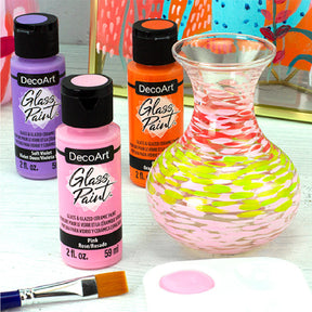 White DecoArt Glass Paint in a 2 oz bottle, suitable for decorating and customizing glass surfaces.