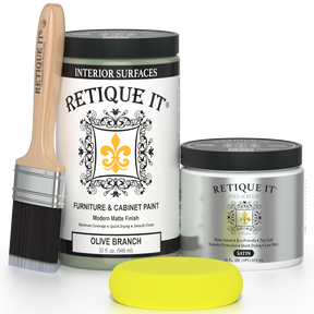 Retique It® olive branch furniture and cabinet paint in a quart, showing a smooth, painted furniture surface in natural light.